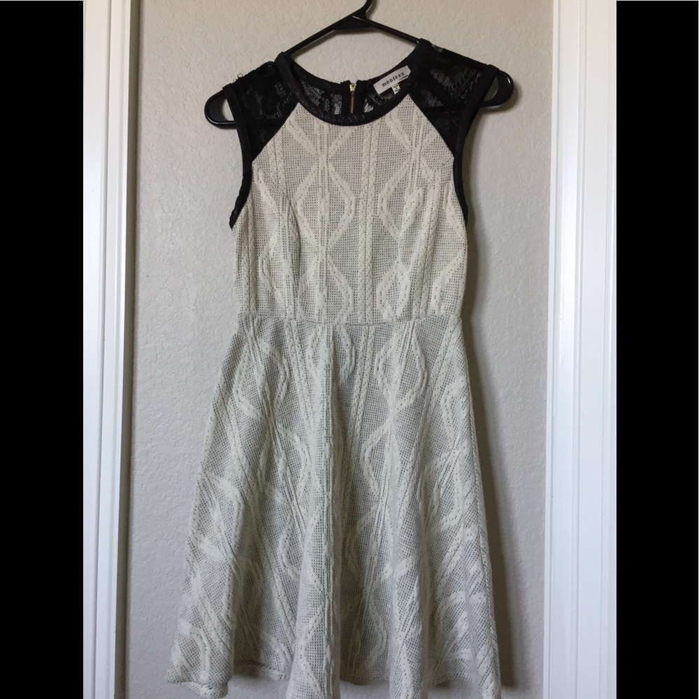 Cream and black sweater dress